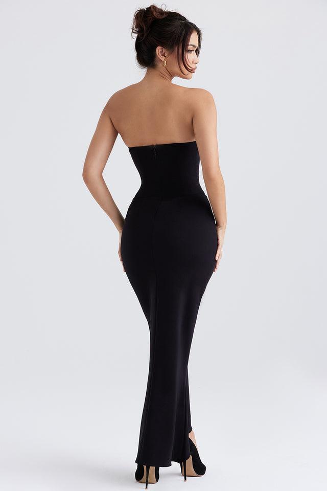 Vestido Longo Brielle em crepe elástico preto com corset estruturado e fenda assimétrica, ideal para eventos sofisticados. Majestique.1