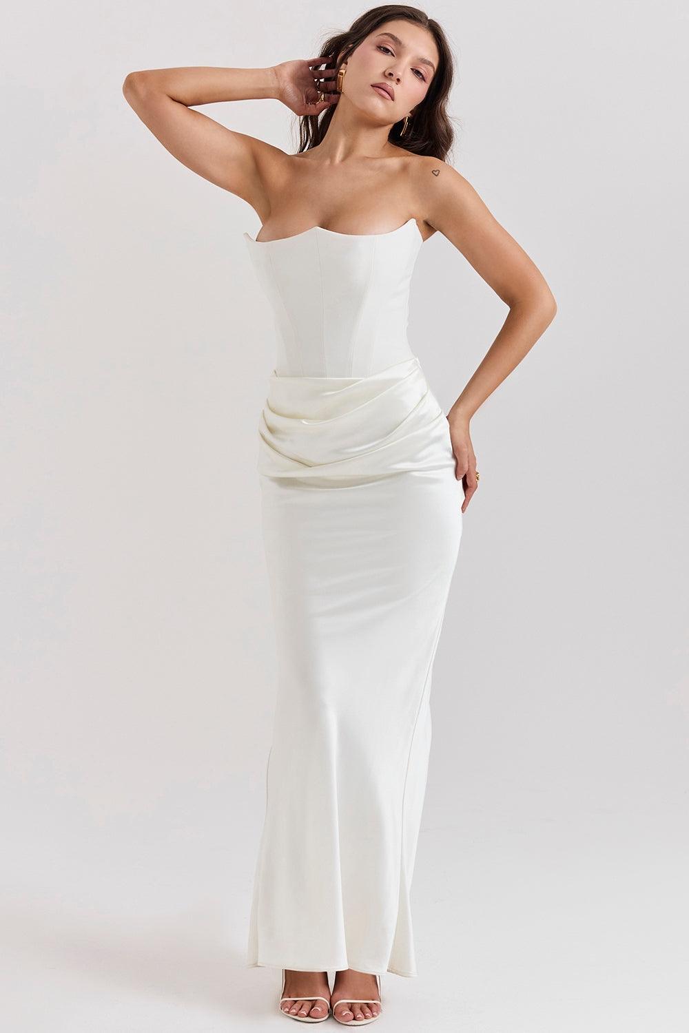 Vestido Longo Amélie disponível nas cores marrom, vermelho, rosa, preto e branco, com corset estruturado e saia de veludo fluída, ideal para eventos sofisticados. Majestique.36