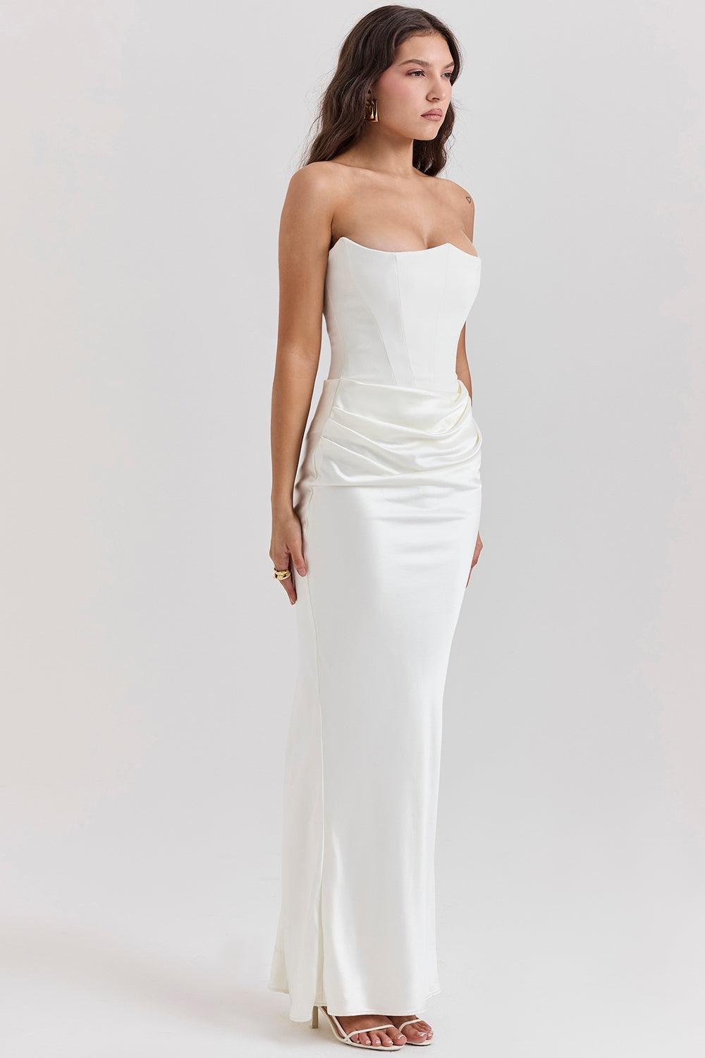 Vestido Longo Amélie disponível nas cores marrom, vermelho, rosa, preto e branco, com corset estruturado e saia de veludo fluída, ideal para eventos sofisticados. Majestique.33