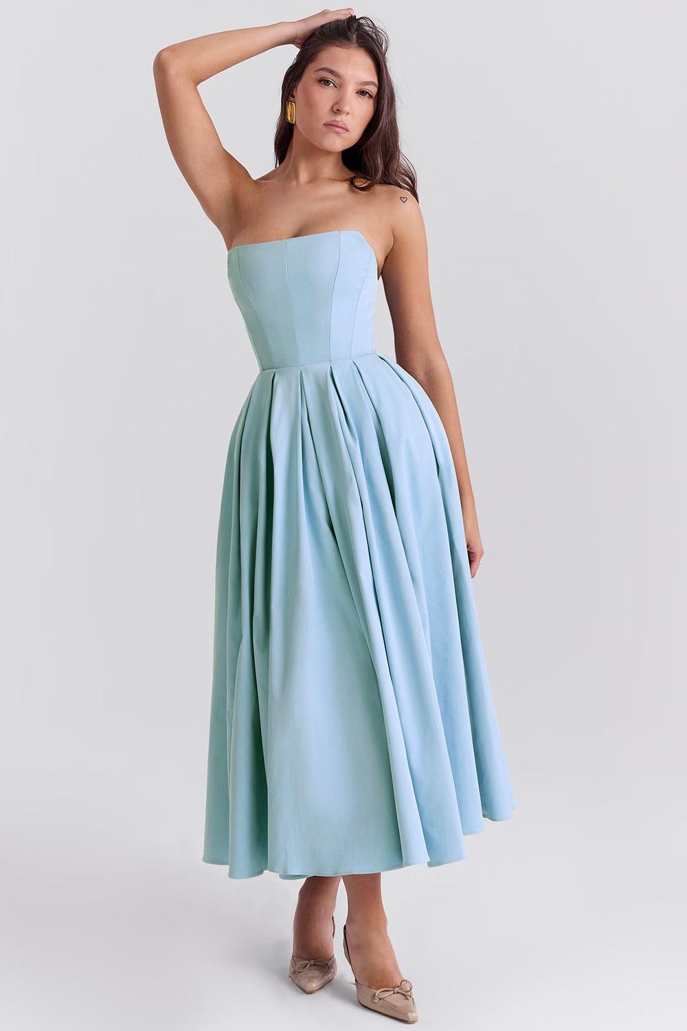 Vestido Midi Calista em azul toscano com corset estruturado e saia plissada volumosa, ideal para eventos sofisticados. Majestique