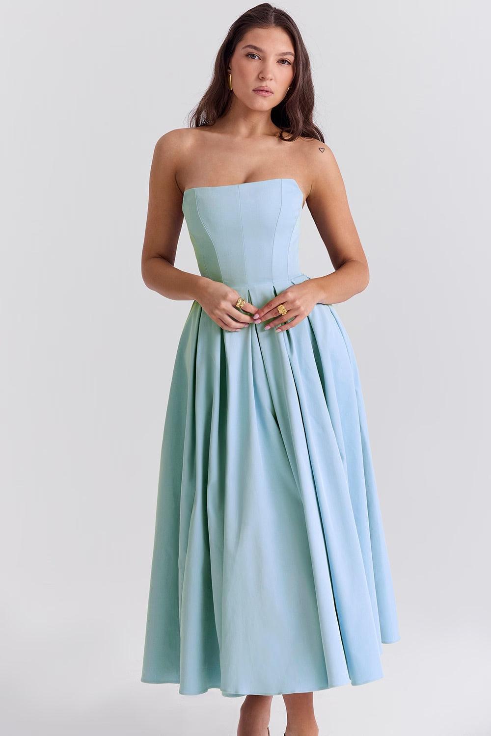 Vestido Midi Calista em azul toscano com corset estruturado e saia plissada volumosa, ideal para eventos sofisticados. Majestique