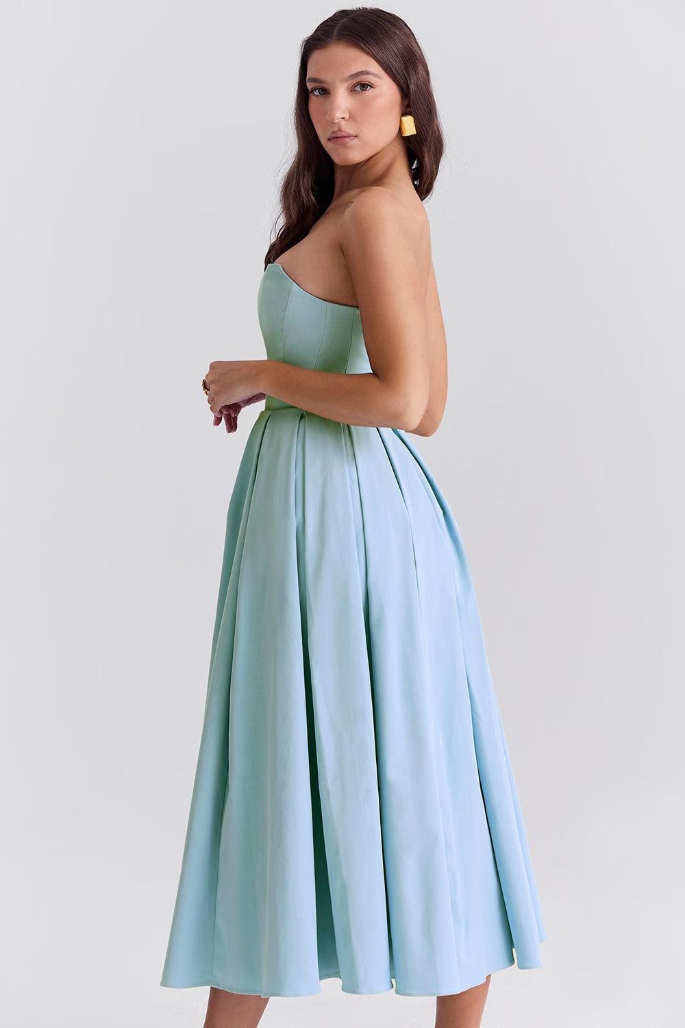 Vestido Midi Calista em azul toscano com corset estruturado e saia plissada volumosa, ideal para eventos sofisticados. Majestique